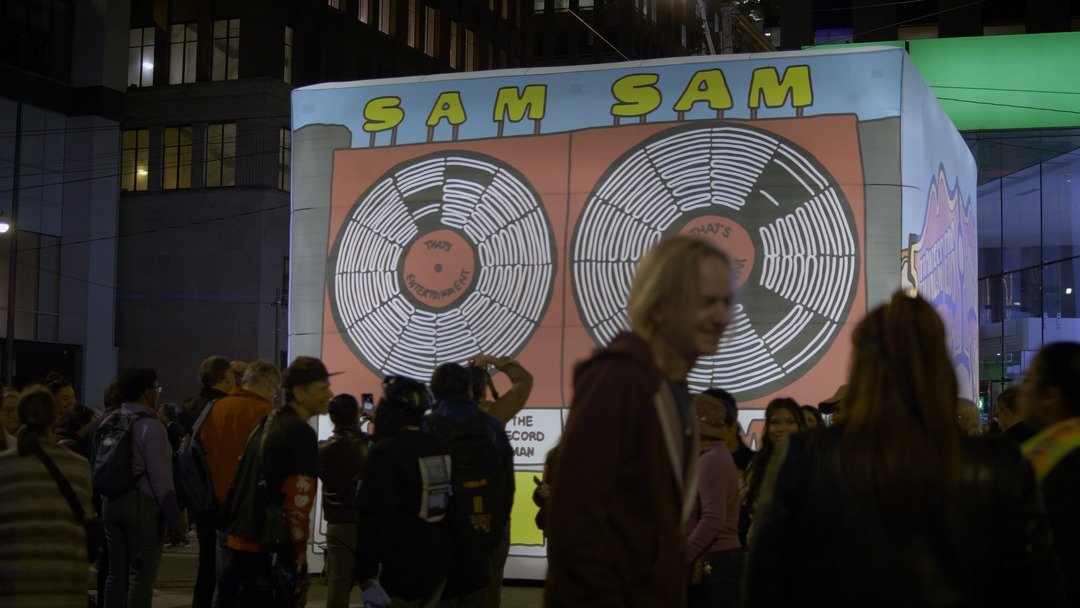 SAM SAM record installation glowing at night
